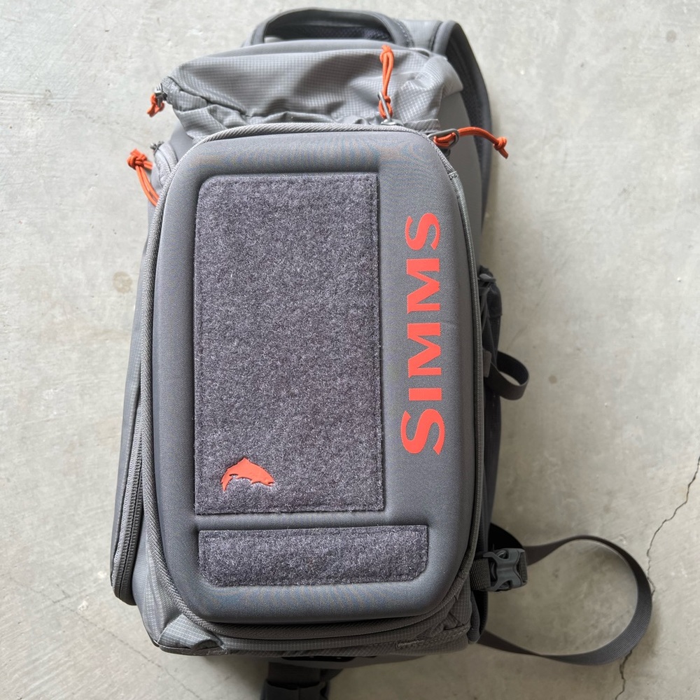 Simms Sling Backpack. Used only a few times. Excellent condition.